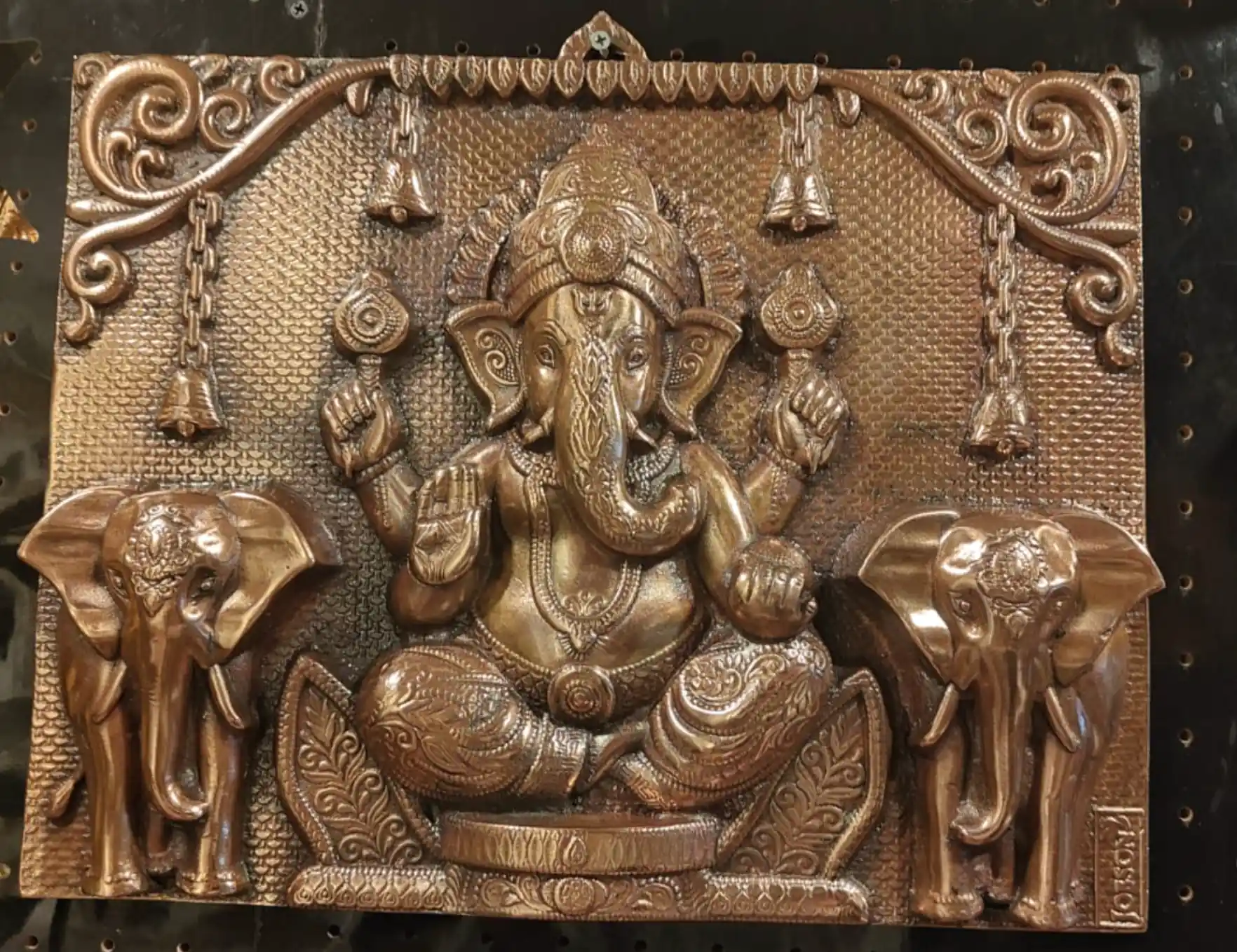 Elegant gun metal Ganesha wall panel with elephant detailing for spiritual home décor and luxury interiors.