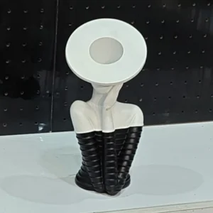 Modern abstract face vase with artistic sculptural design for luxury home décor and contemporary interiors.