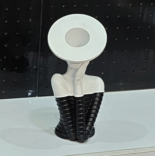 Modern abstract face vase with artistic sculptural design for luxury home décor and contemporary interiors.