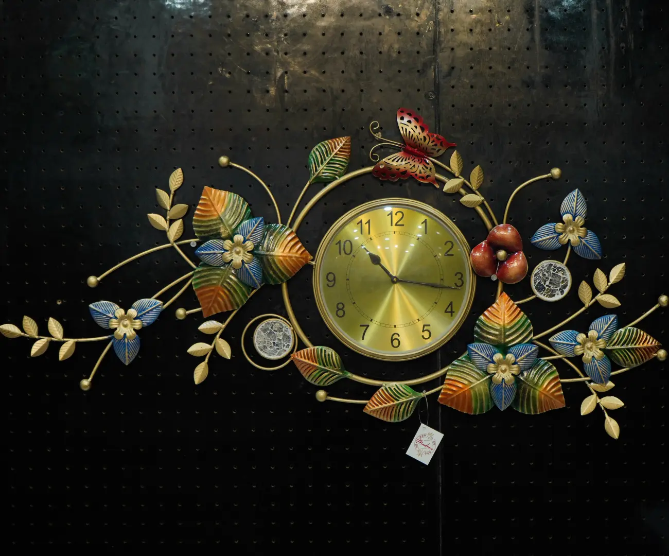 Luxury floral wall clock with butterfly wall clock decor and elegant metal artwork for living room interiors.