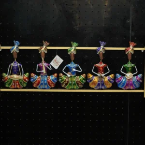 Traditional musician wall decor with colorful handcrafted metal art design for living room interiors.